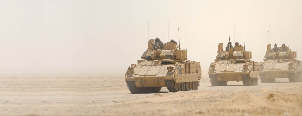 Bradley tanks in the desert